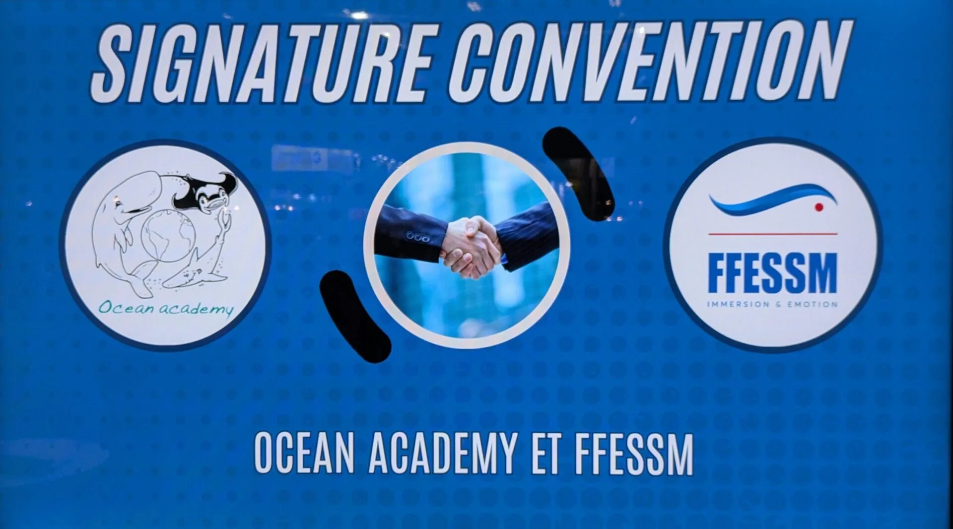 Visuel de signature de convention entre OA et la FFESSM